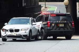 SUV In Crash Rolls Into Ridgewood Police Car