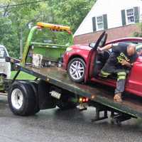 Driver Taken Into Custody After Pulling Into Ridgewood Driveway