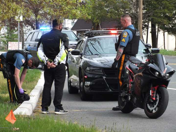 Waldwick police with the motorcyclist.