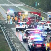 <p>The driver was placed into the ambulance at right following the Wednesday morning crash Oct. 5 on northbound Route 287 in Mahwah.</p>