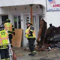 Driver Reaching For Dropped Cell Phone Slams Van Into Waldwick Service Station, Police Charge