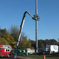 <p>Firefighters from Fair Lawn Fire Company #2 brought a ladder truck to the Fair Lawn DPW garage on Saddle River Road on Thursday, Oct. 20.</p>