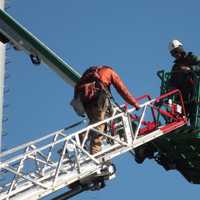 <p>Firefighters from Fair Lawn Fire Company #2 brought a ladder truck to the Fair Lawn DPW garage on Saddle River Road on Thursday, Oct. 20.</p>