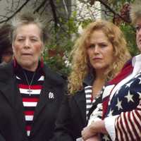 <p>Many people wore patriotic apparel at the ceremony.</p>