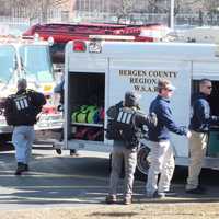 <p>Dive and rescue teams from several towns converged at the Passaic River on Wednesday.</p>