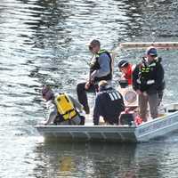 <p>One of the search teams in the Passaic River.</p>