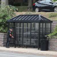 <p>NJ Transit K-9 checks the bus stop on Kinderkamack Road in front of the Continental Gardens complex in River Edge.</p>