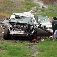 PHOTOS: Two Adults, Two Dogs Freed In GSP Crash In Washington Township