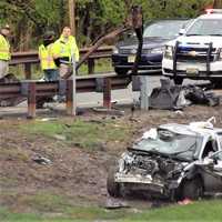 <p>The car came to rest in a grassy ditch between the Exit 168 ramp and the northbound Parkway.</p>