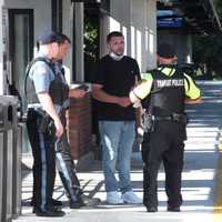 <p>Kore James speaks to police.</p>