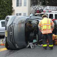 Firefighters Extricate Victim In Fair Lawn Rollover