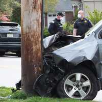 SUV Hits Parked Car, Slams Into Utility Pole In Glen Rock