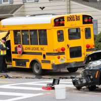 <p>Ridgewood police and firefighters responded, as both boys and their driver watched from across the street.</p>