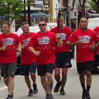 <p>The 2019 Special Olympics New Jersey Law Enforcement Torch Run passes through Ridgewood.</p>