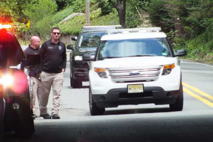 PHOTOS: Authorities Recover Body Stranded On Bridge Pillar In Passaic River