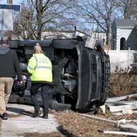 <p>The Jeep driver climbed out after the vehicle crashed through a fence and landed on its side just off Route 17 in Paramus on Tuesday, March 7.</p>