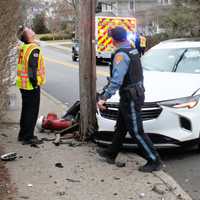 <p>The Buick Enclave was towed and village firefighters helped clean up the wreckage following the crash on Oak Street in Ridgewood on Friday, March 10.</p>