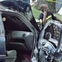 <p>Firefighters doused the flames and worked with police to rescue the driver of the other car.</p>