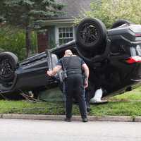 SUV Hits Utility Pole, Rolls In Glen Rock