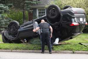 SUV Hits Utility Pole, Rolls In Glen Rock