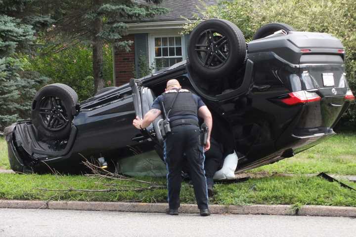 SUV Hits Utility Pole, Rolls In Glen Rock