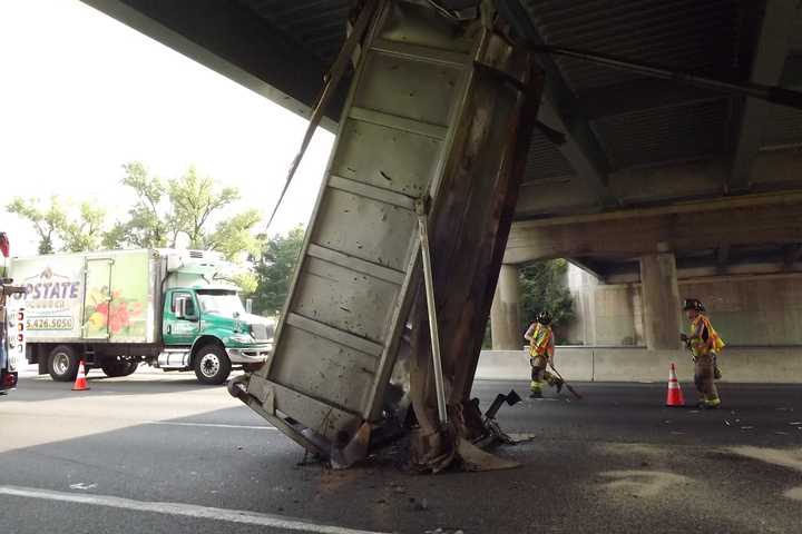 Vertical Hold: Dump Truck Trailer Gets Wedged Under Route 17 Overpass In Mahwah