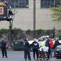 <p>The Fire Department raised a truck ladder so the victim could be secured in the bucket by firefighters and EMS workers.</p>