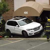 <p>The BMW SUV ended up on the steps of the Midland Park dental office.</p>