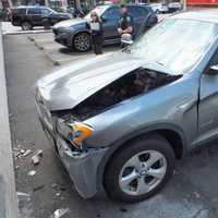 <p>The BMW SUV sustained considerable damage after slamming into the side of the commercial building on Rock Road</p>