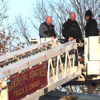 <p>Paramus firefighters helped their police brethren get the suspect down from the roof.</p>