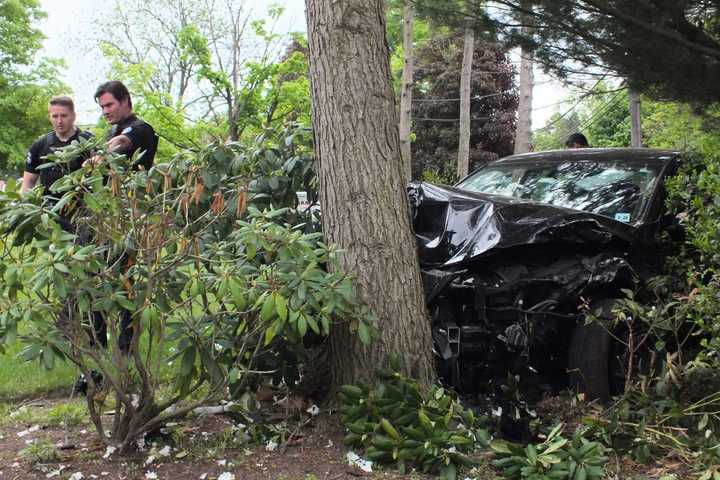 HEAD SCRATCHER: Driver Hospitalized After Tree Crash In Paramus Jams Sedan In Tight Spot