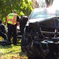 Minivan Slams Into Paramus Tree: Driver Hospitalized, Wheelchair-Bound Passenger OK
