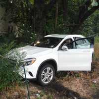 <p>The Mercedes tore into a chainlink fence on Route 17 in Ridgewood.</p>