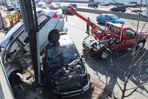 PHOTOS: Minivan Lands On Pickup Truck On Route 4