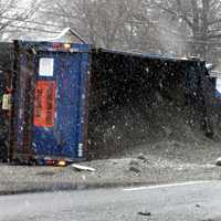 <p>The dump truck spilled its load of gravel across southbound Route 17 in Paramus.</p>