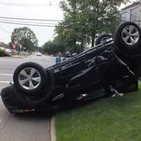 <p>The Jaguar landed on its roof on a Paramus resident's lawn.</p>