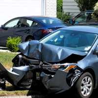 Driver Hospitalized After Sedan Slams Into Pole In Glen Rock