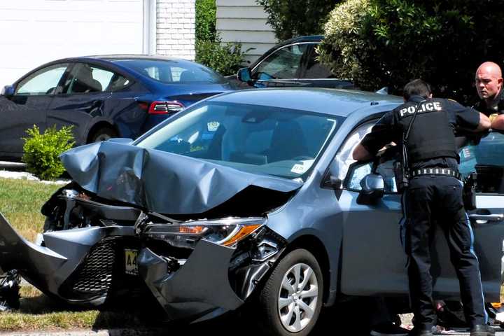 Driver Hospitalized After Sedan Slams Into Pole In Glen Rock