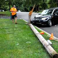 Driver Hospitalized After Older-Model SUV Rams, Splits Pole In Glen Rock