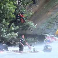 <p>The rescuer comes for the second Clifton firefighters at the bottom of the Dundee Dam in the Passaic River on Wednesday, June 28.</p>