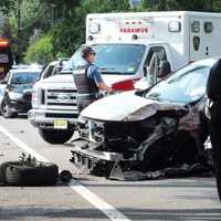 <p>A 78-year-old driver was hospitalized and received a summons after his SUV collided with another vehicle and slammed into a utility pole in Paramus on Sunday.</p>