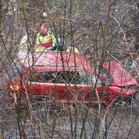 Jeep Crashes Through Guardrail In Mahwah, Lands In Creek