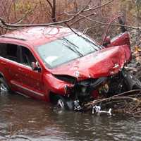 <p>A Jeep slammed through a guardrail along Rt. 17 in Mahwah and down an embankment Sunday.</p>