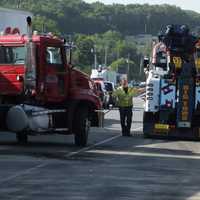 <p>Heavy-duty wreckers were needed to clear the southbound highway in front of Ramsey Alfa Romeo in Upper Saddle River.</p>