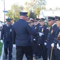 <p>Emerson firemen in their dress blues for the 9/11 memorial.</p>