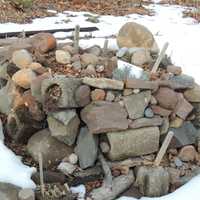 <p>An herb garden planted in a sculptural rock construction.</p>