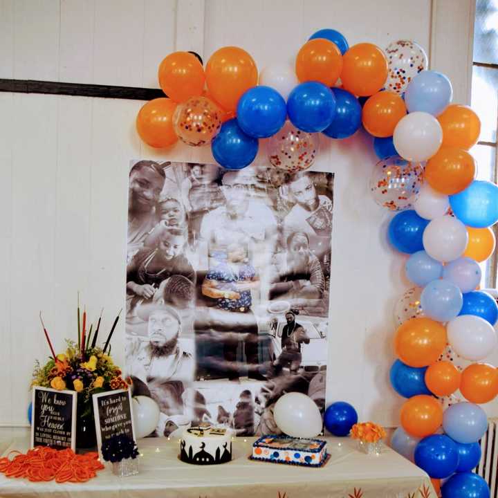 A display in honor of Kendell Jerome Cook at the community dinner.