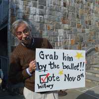 <p>U.S. Rep. Jim Himes meets an enthusiastic voter at a reproductive rights rally in Westport.</p>