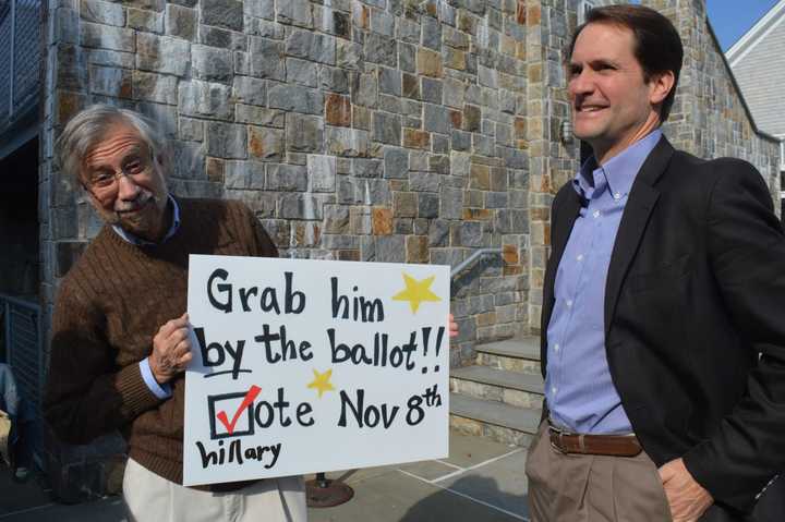 U.S. Rep. Jim Himes meets an enthusiastic voter at a reproductive rights rally in Westport.