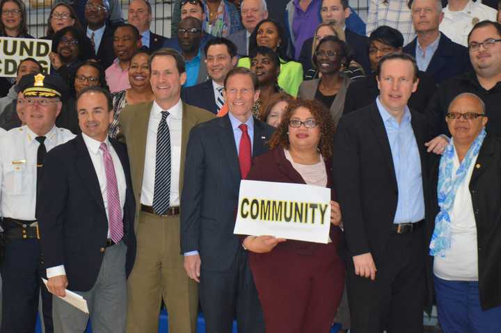 Bridgeport Police Chief AJ Perez, Mayor Joe Ganim, U.S. Rep. Jim Himes, U.S. Sen. Richard Blumenthal and U.S. Sen. Chris Murphy joined a rally to protest proposed federal budget cuts in Bridgeport Tuesday.